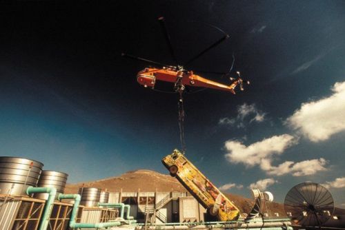 Swrodfish bus lifted by helicopter